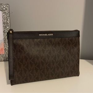 Michael Kors
monogram logo pouch wristlet